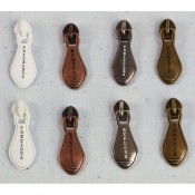 Junkyard Findings - Typo Zipper Pulls